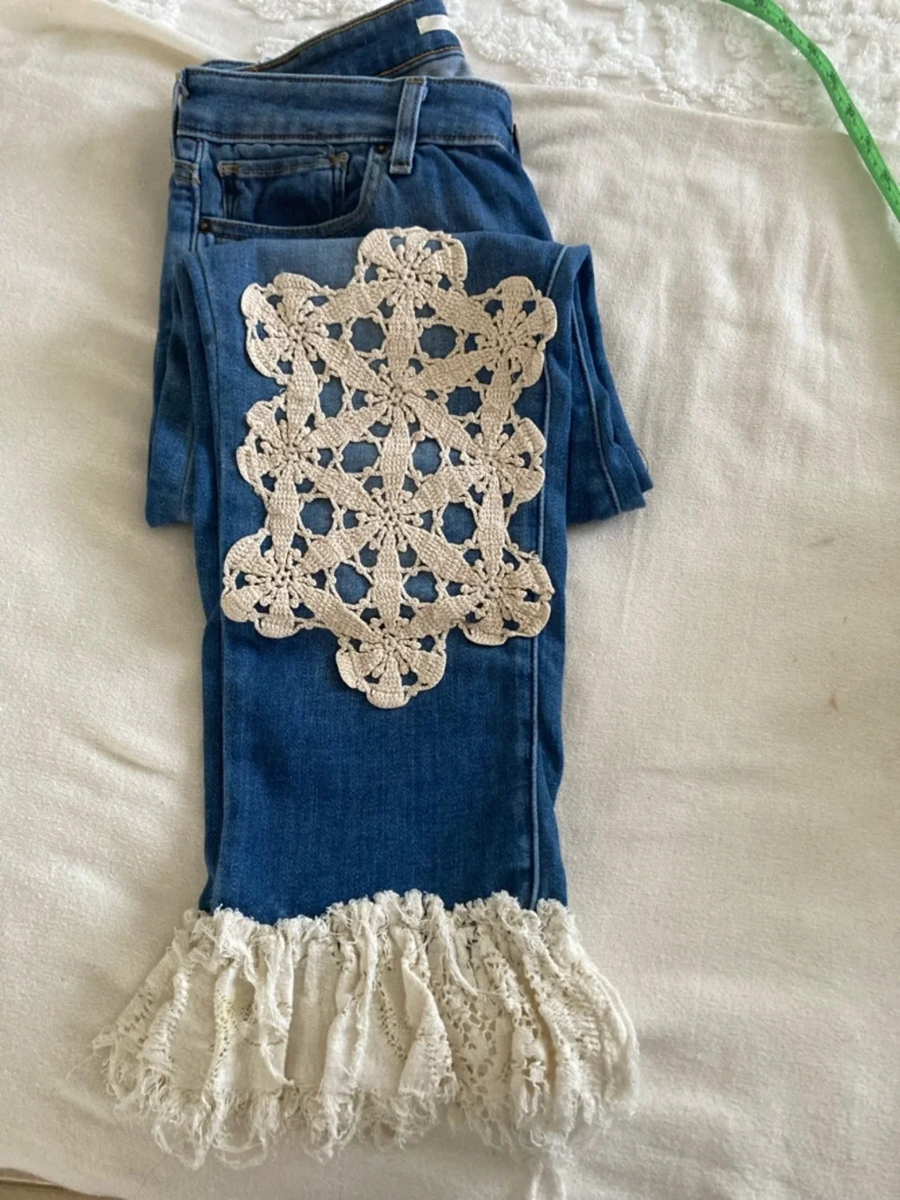 Levi's Blue Cropped Jeans with White Crochet Appliqués and Fringe - Picture 2 of 6